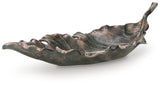 Side view of Avermund cast aluminum leaf sculpture