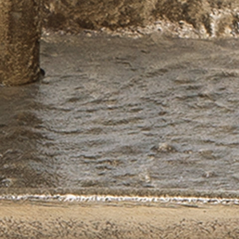 Wallmond collection color swatch showing antique brass finish