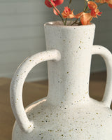 Close-up of vase rim and glossy finish