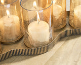 Evereton candle holder on table displaying five candle slots