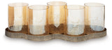 Side angle of Evereton candle holder showing antique gold metal base and curved arms