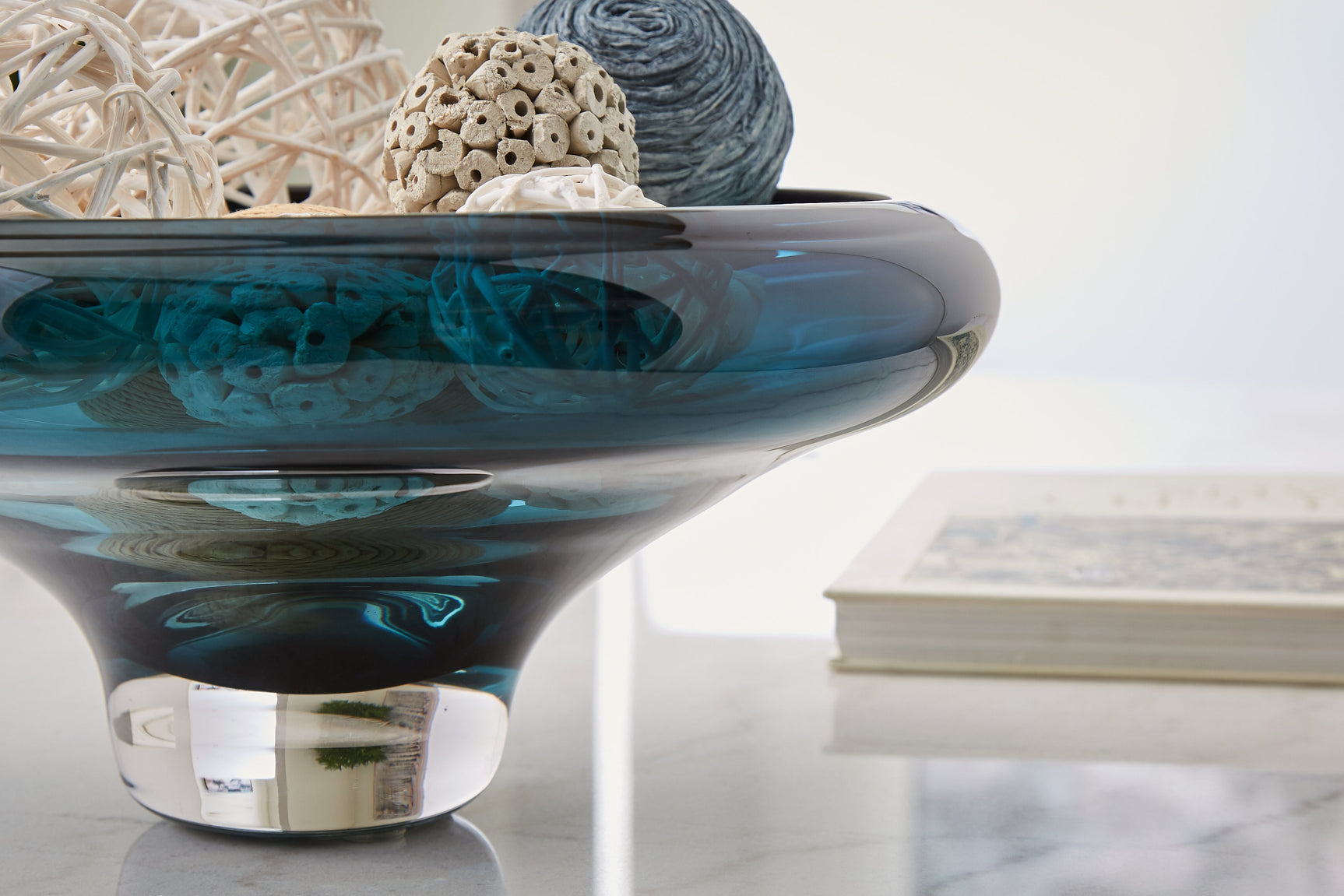 Close-up of Vallborough teal blue bowl finish