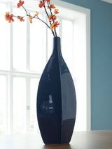 Abtinson navy vase shown with dried florals