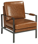 Side view of Peacemaker Brown Accent Chair highlighting antiqued brass-tone metal frame