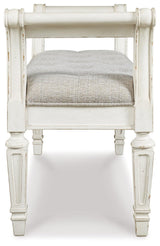 Realyn Antique White Accent Bench decorative arm detail