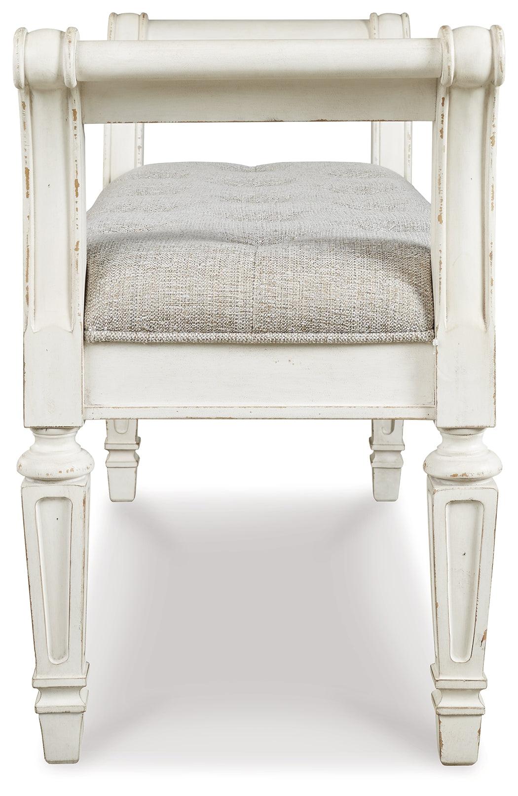 Realyn Antique White Accent Bench decorative arm detail
