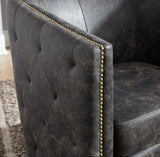 Close-up of tufted sides and nailhead trim on Brentlow chair