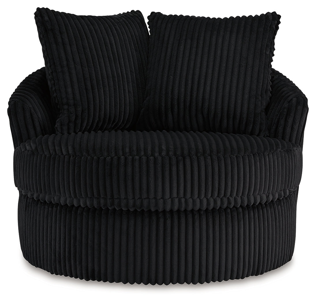 Gramwell Onyx Swivel Chair head-on view showing striped fabric and cushions