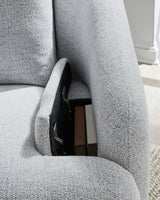 Detail close-up of storage compartments inside arm bolster
