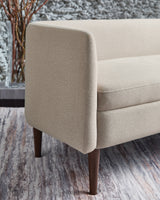 Close-up detail of Wainner Beige Accent Bench upholstery and stitching