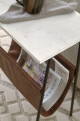 Close-up of Etanbury Accent Table magazine holder in brown faux leather