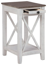Adalane Accent Table angled open drawer showing storage