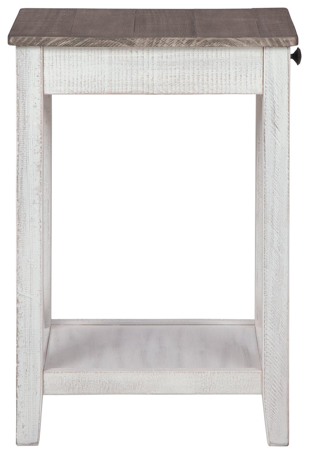 Side view of Adalane Accent Table showing crossbuck supports