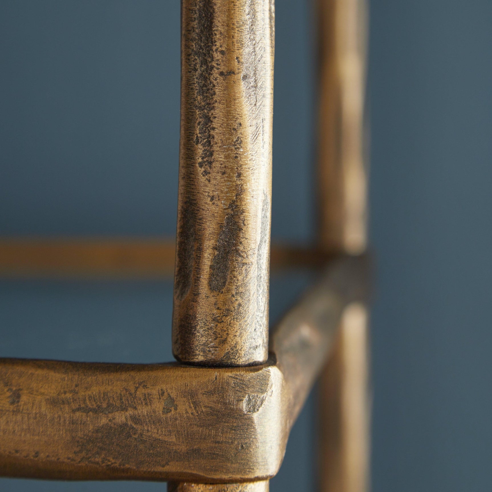 Close-up of antique brass frame detail on Ryandale bookcase