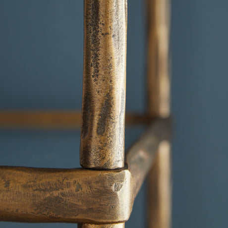 Close-up of antique brass frame detail on Ryandale bookcase