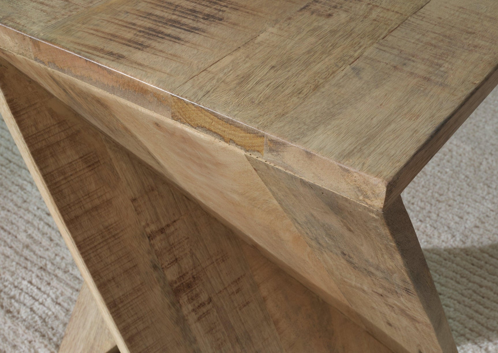 Close-up of Zalemont Distressed Brown Accent Table finish and saw mark plank detail