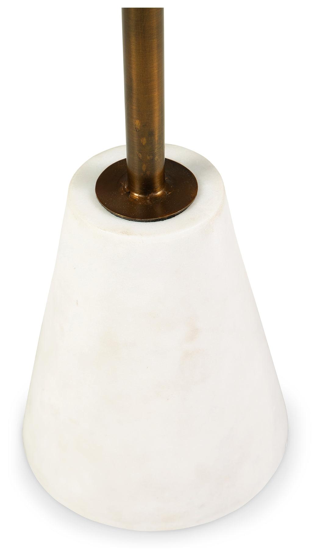 Detail of white marble base and goldtone pedestal of Caramont accent table