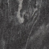 Top-down view of Caramont black and white marble round tabletop