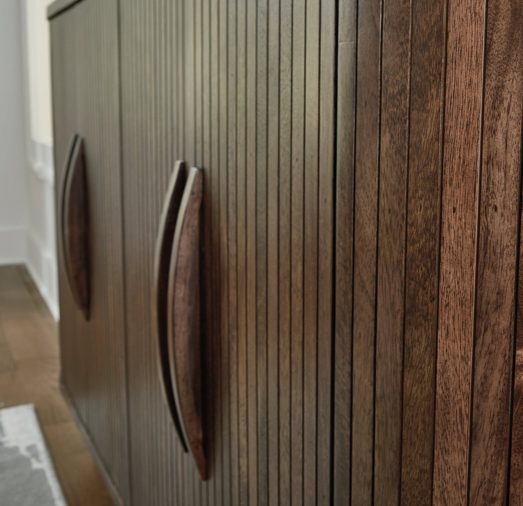 Amickly Accent Cabinet close-up of wood door pull