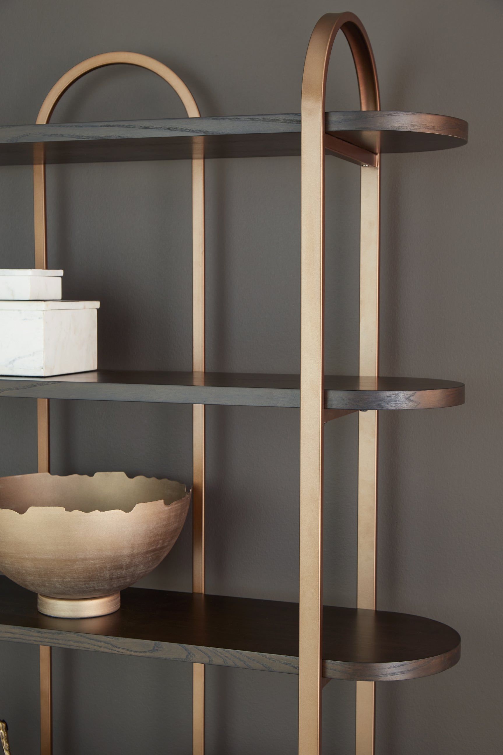 Close-up of Brentmour bookcase goldtone metal frame detail