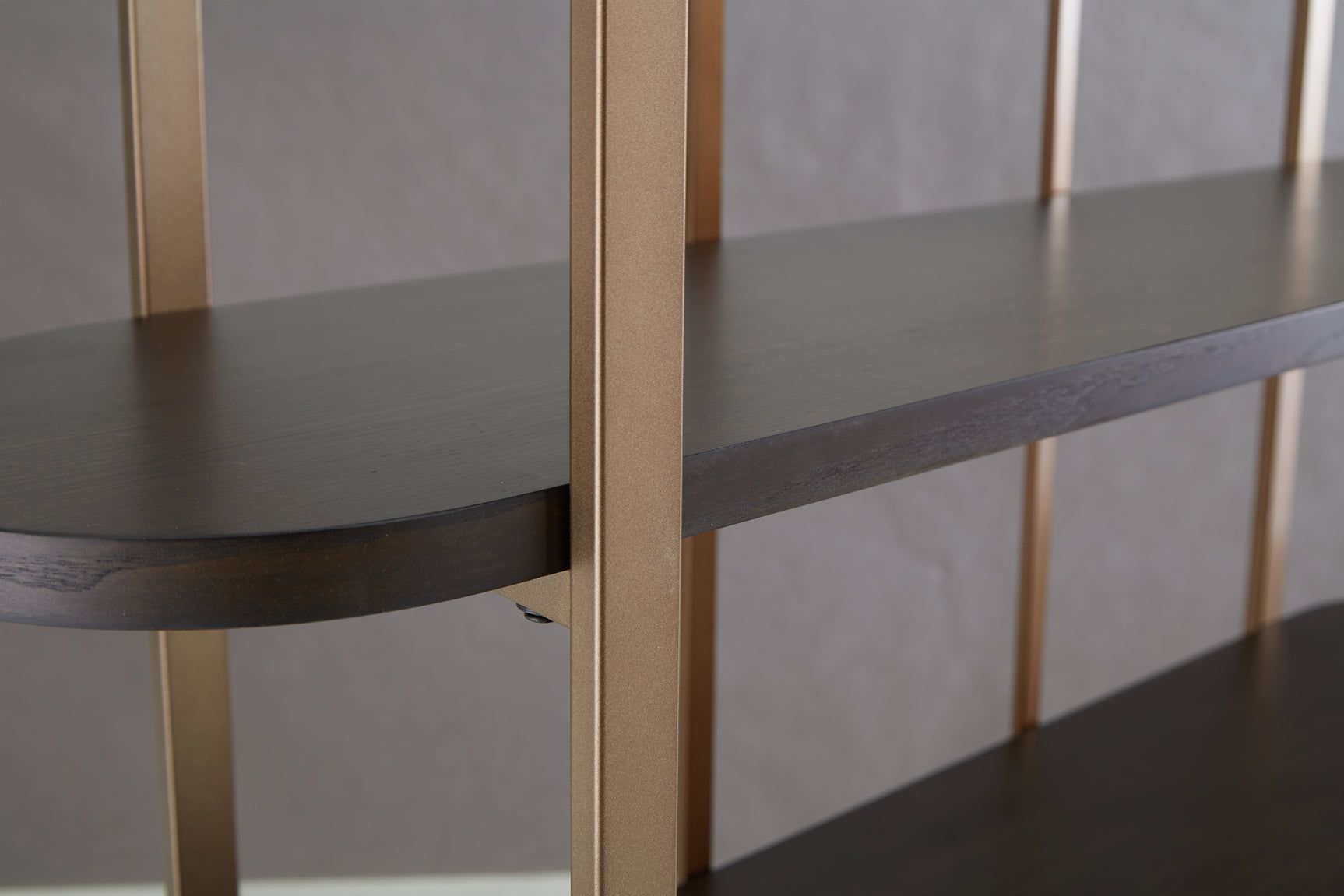 Close-up of Brentmour bookcase dark brown wood shelf finish