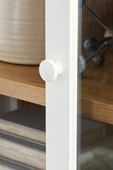 Close-up of wood door pull on Dagandale cabinet