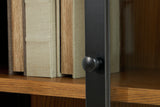 Close up of black wood door pull on Dagandale Accent Cabinet