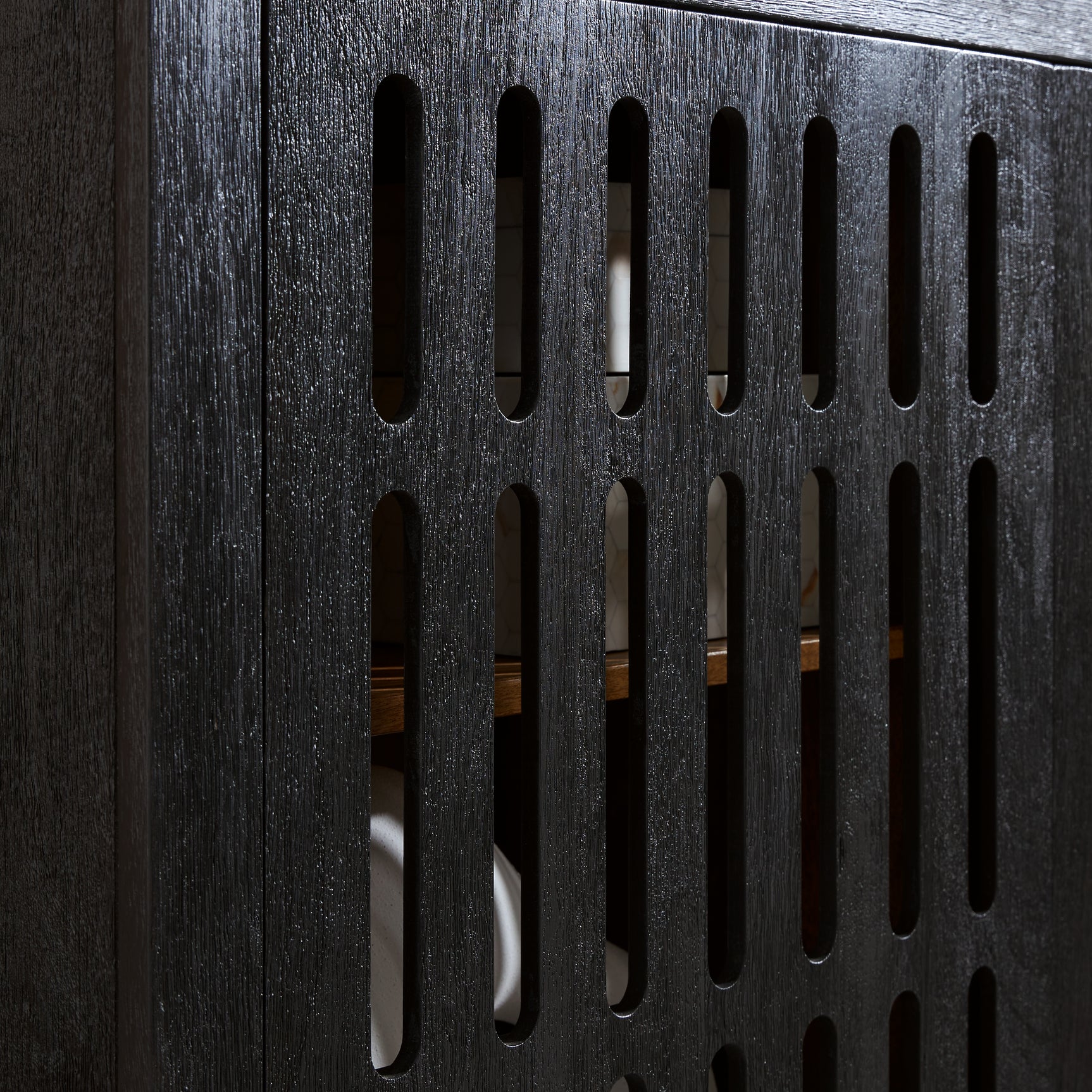 Close-up of Vallisburg Accent Cabinet door with magnetic push latch