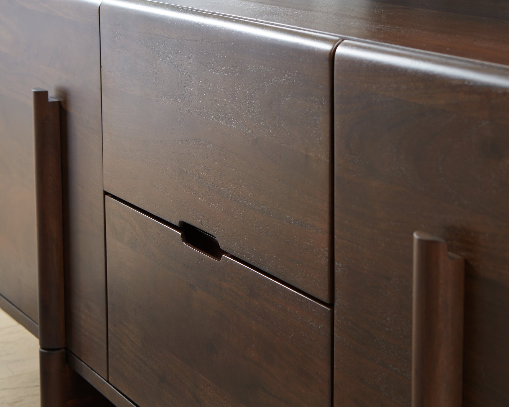Detail of Kydler Accent Cabinet wood finish and pulls
