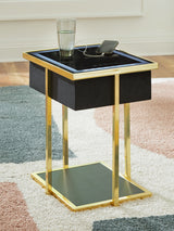 Close-up of speaker and control panel on the table