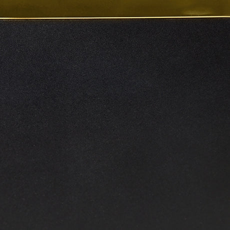 Close-up of gold-tone metal frame finish