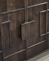 Close-up of oversized wood door pulls