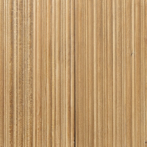 Close-up of light antique beige finish on wood