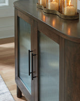 Close-up of Mayridge Accent Cabinet wood and glass detail