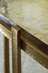 Close-up of gold plated metal frame finish of Porterville accent table