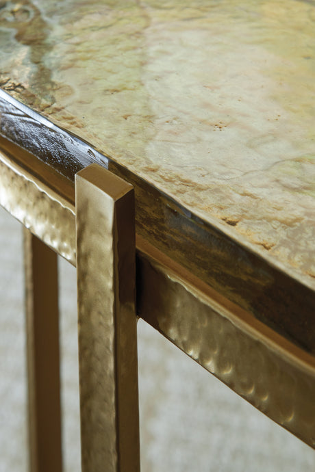 Close-up of gold plated metal frame finish of Porterville accent table