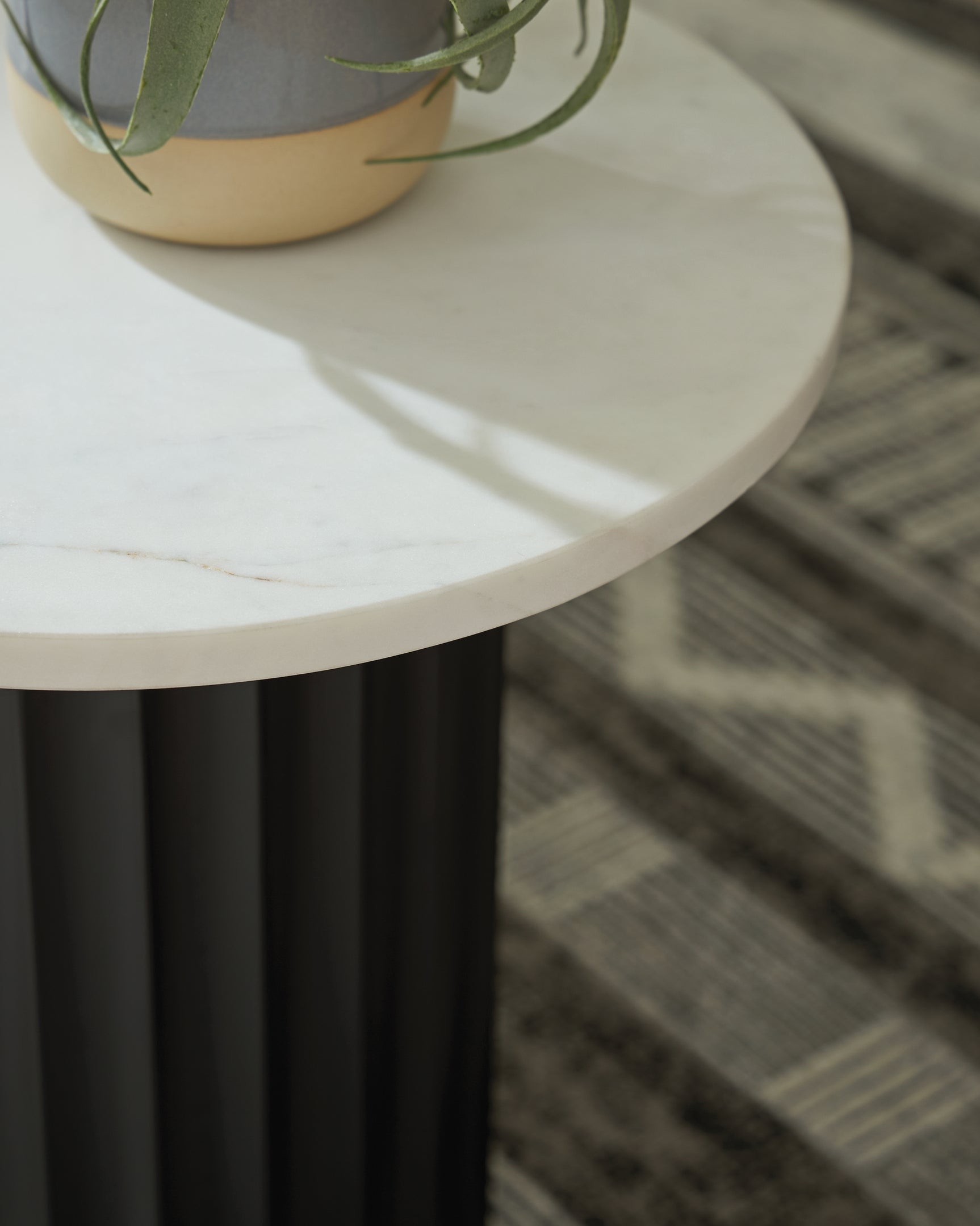 Close-up of white marble top with natural veining