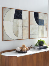 Angled view of Bexlen set of two wall art pieces with tan and black tones