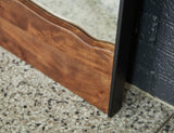 Detail of Panchali faux live-edge frame on floor mirror