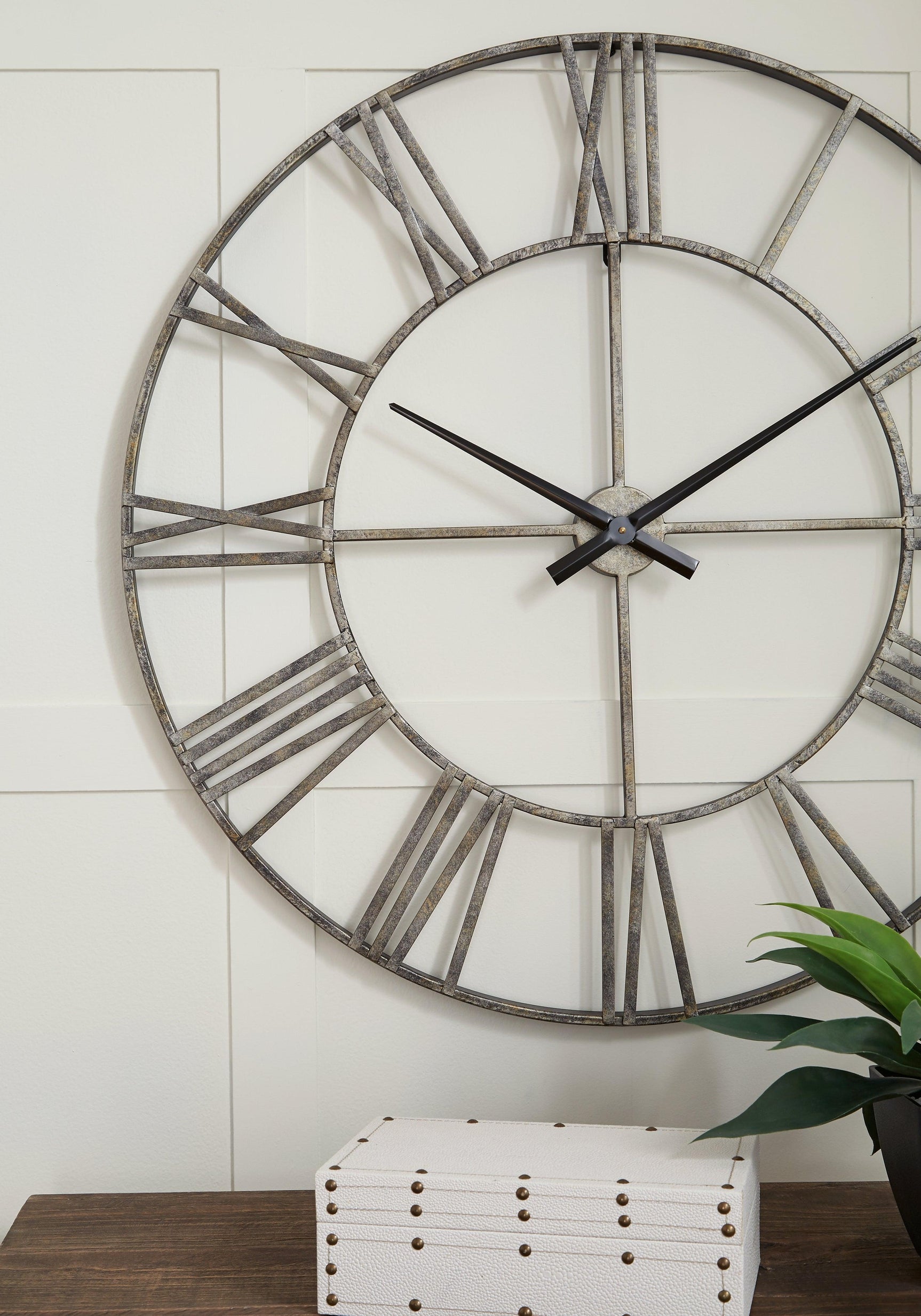 Detail showing antiqued silver finish on Paquita Wall Clock