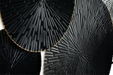 Side angle of Rhetlen Wall Decor highlighting depth and finish