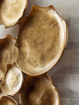 Close-up detail of Gageton antique gold finish and texture