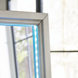 LED cyan light glow on mirror