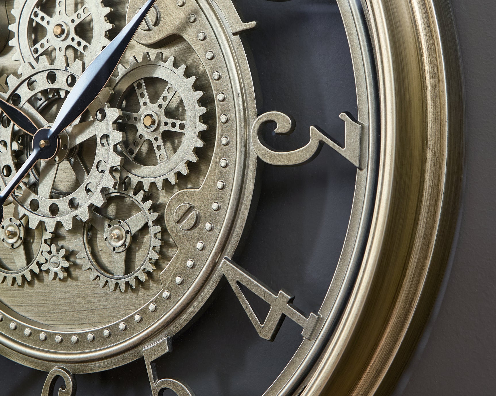 Gilover wall clock close-up of moving gears