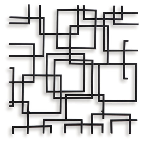 Side angle of Aadanton black metal wall decor showcasing depth