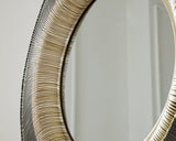 Close-up detail of Dallmen accent mirror metal finish