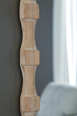 Detail of light brown wood frame finish