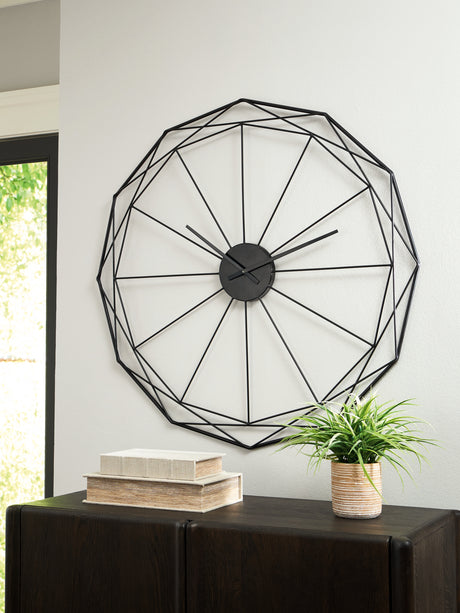 Close-up angled view of Arkthorne black metal wall clock design