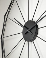 Detail close-up of Arkthorne wall clock black metal finish
