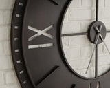 Close-up detail of Lytle wall clock metal frame and numerals